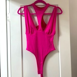 Cutout hot pink rave bodysuit